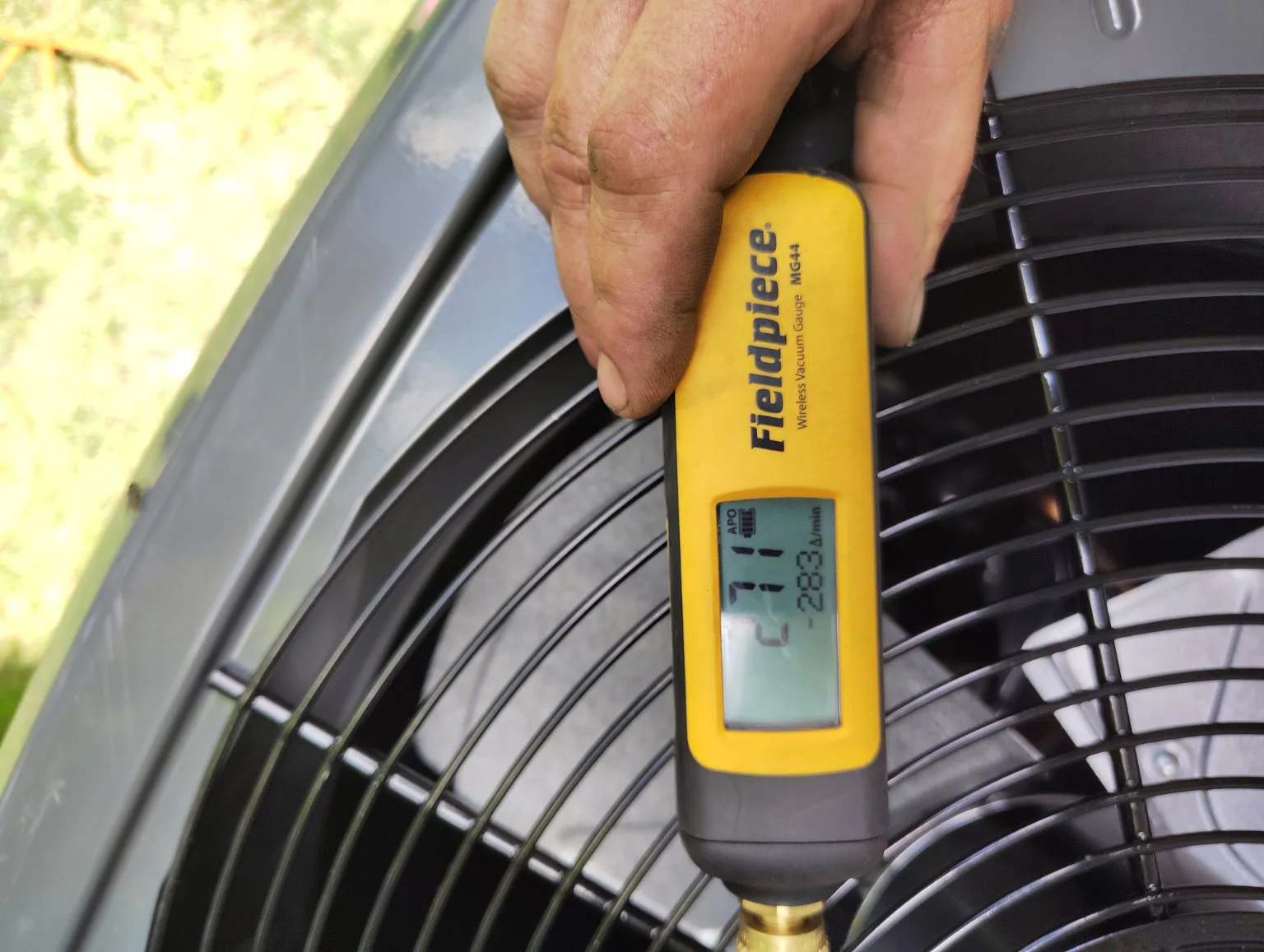 Digital micron gauge tracking evacuation during sealed-system HVAC work